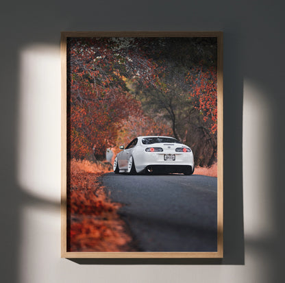 Toyota Supra MK4 in autumn setting poster with vibrant fall colors and detailed road wall art.