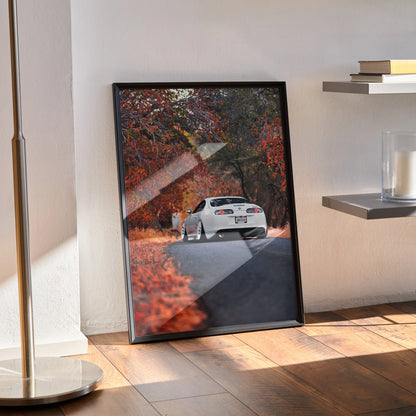 Toyota Supra MK4 parked on autumn road poster wall art with vibrant fall foliage.