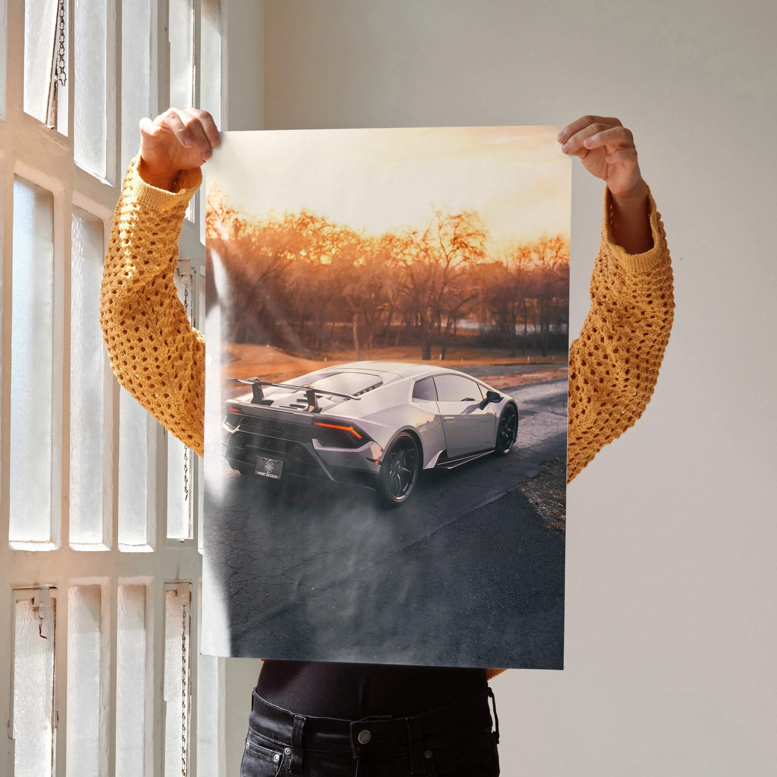 Lamborghini Huracan poster with sunset background and glossy High Resolution wall art.