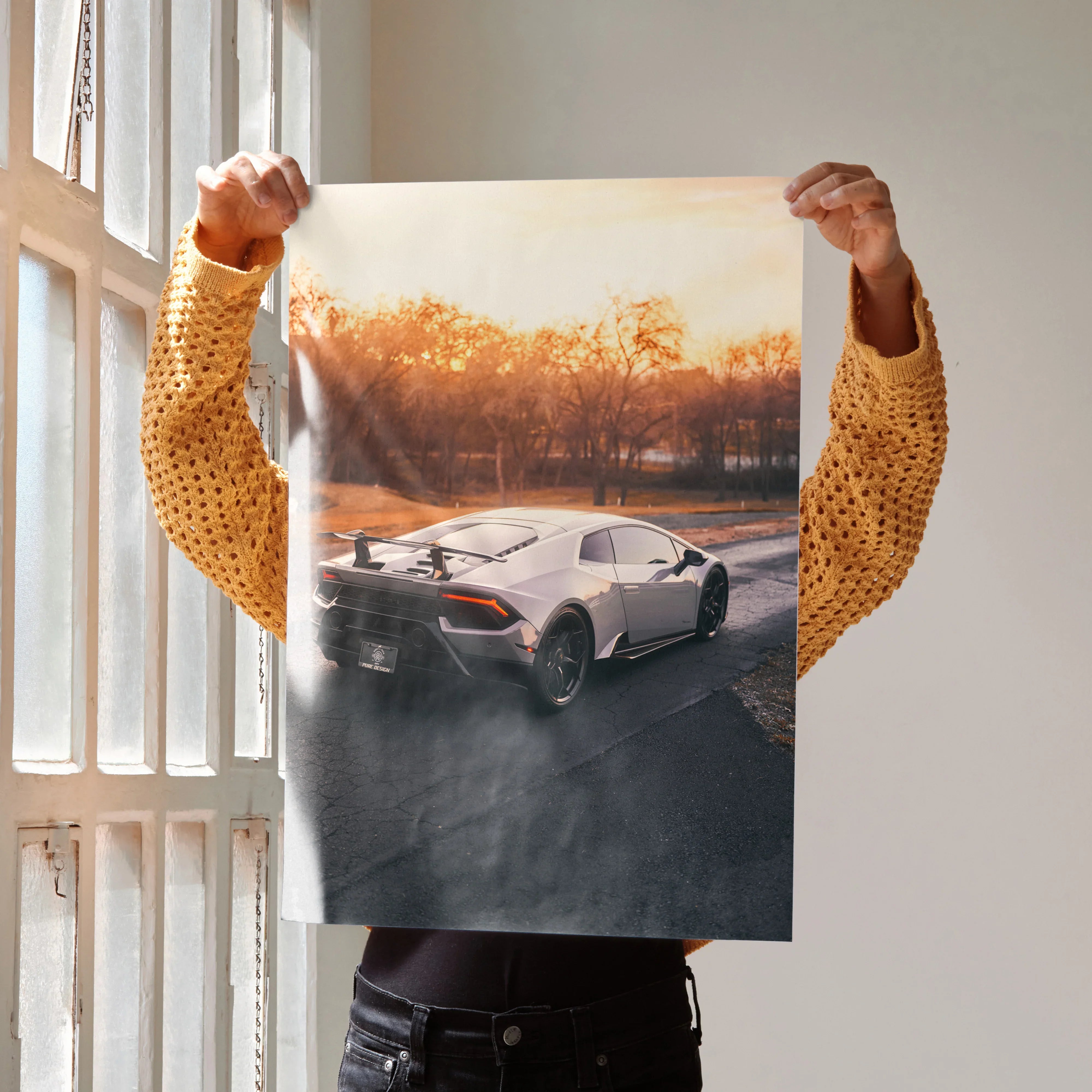 Lamborghini Huracan poster with sunset background and glossy High Resolution wall art.