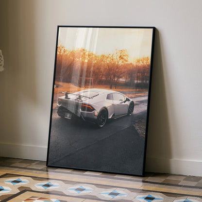 Lamborghini Huracan poster with luxury automotive wall art featuring a white sports car at sunset.