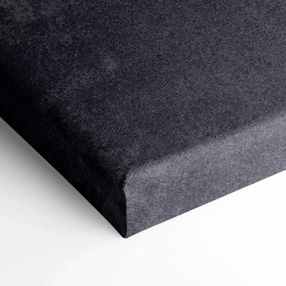 Close-up of black textured canvas edge showcasing museum-quality wall art wrap.