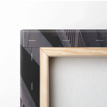 Close-up of corner wood frame with high-resolution black and gray Mitsubishi Evo 8 canvas art wall print.