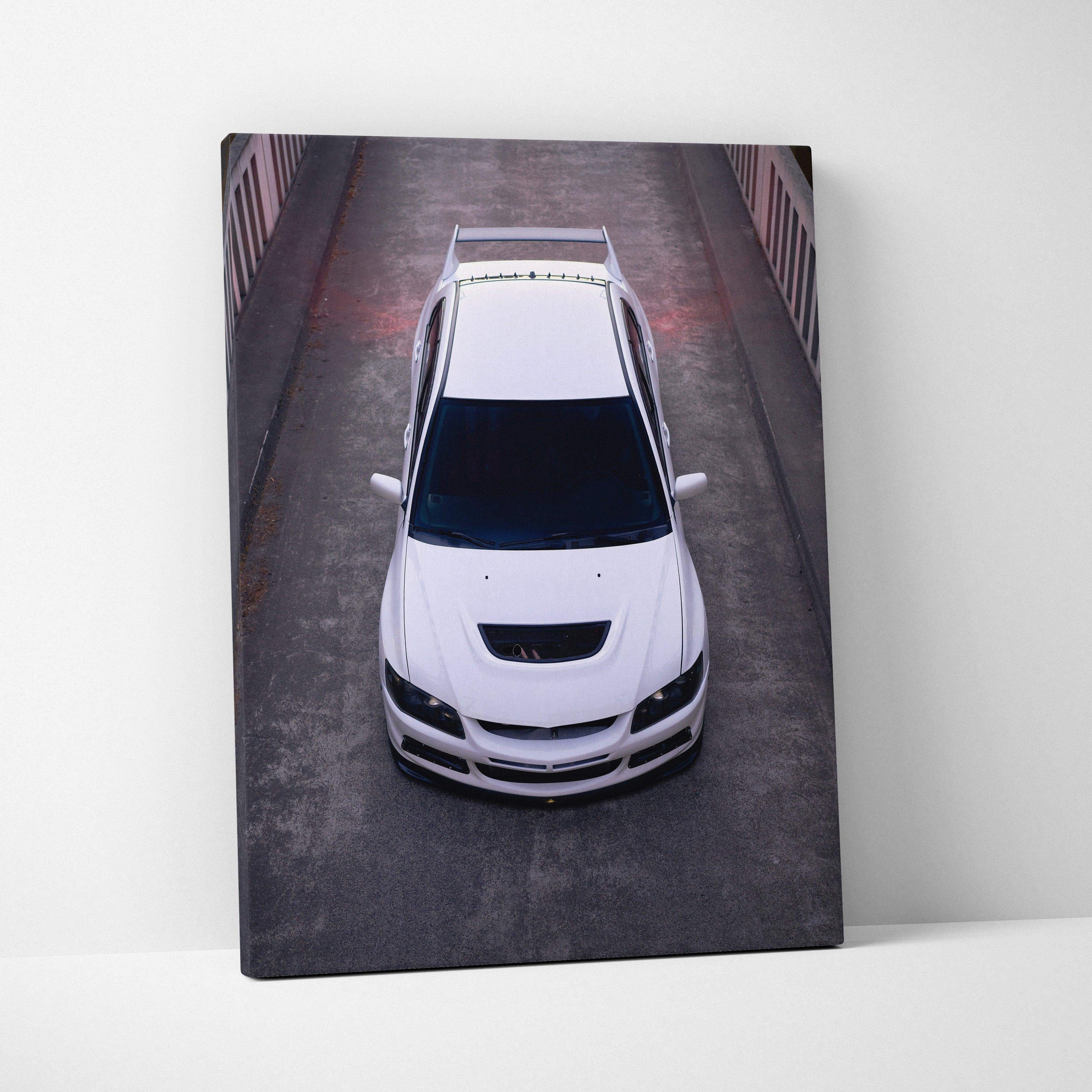 White Mitsubishi Evo 8 top view on dark road canvas art vertical wall art.