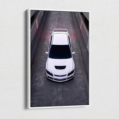 White Mitsubishi Evo 8 from above on dark road, vertical canvas wall art print.