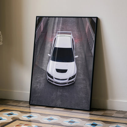 Mitsubishi Evo 8 JDM car wall art poster with white sports car photo and black frame.