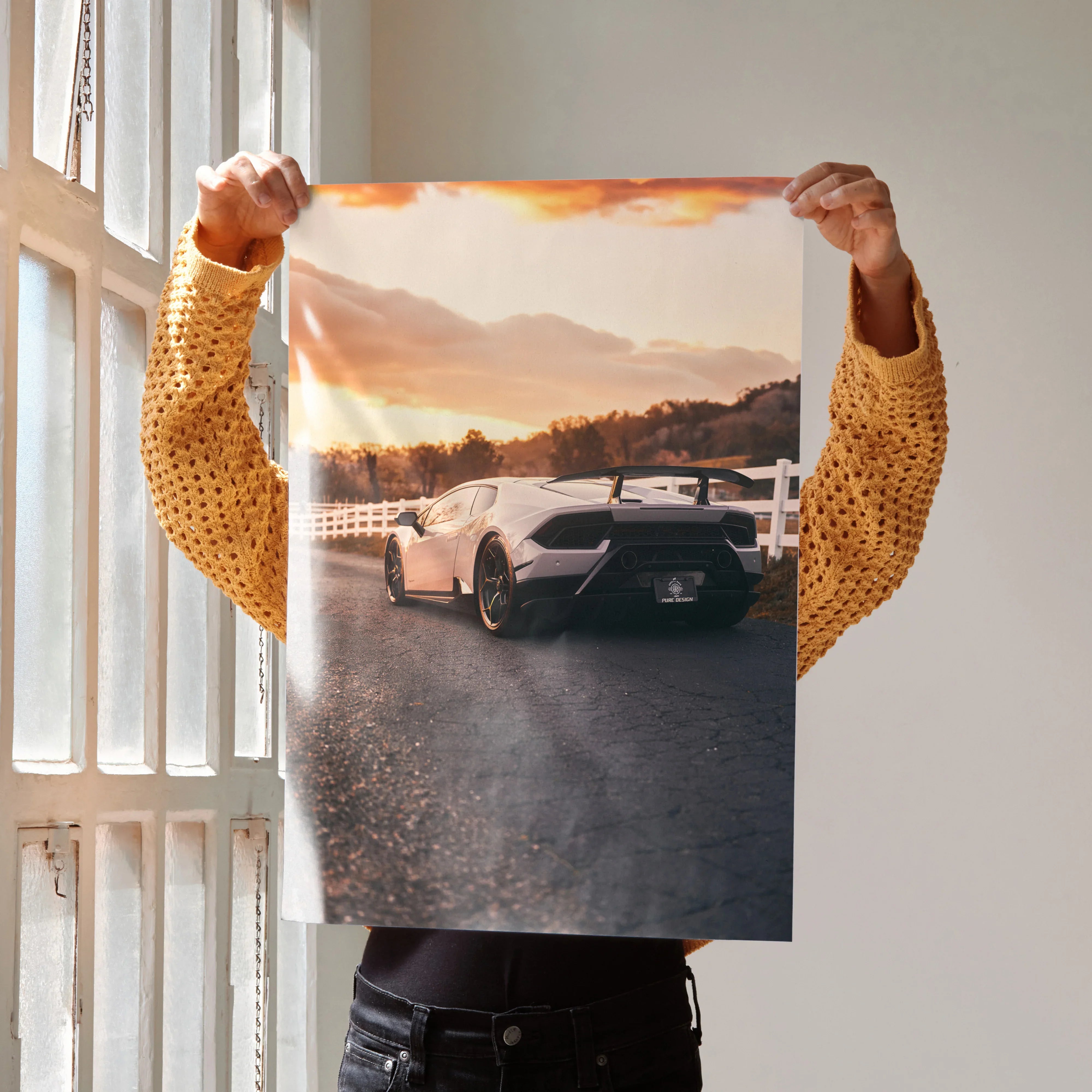 Lamborghini Huracan poster showing rear view on sunset road luxury wall art.