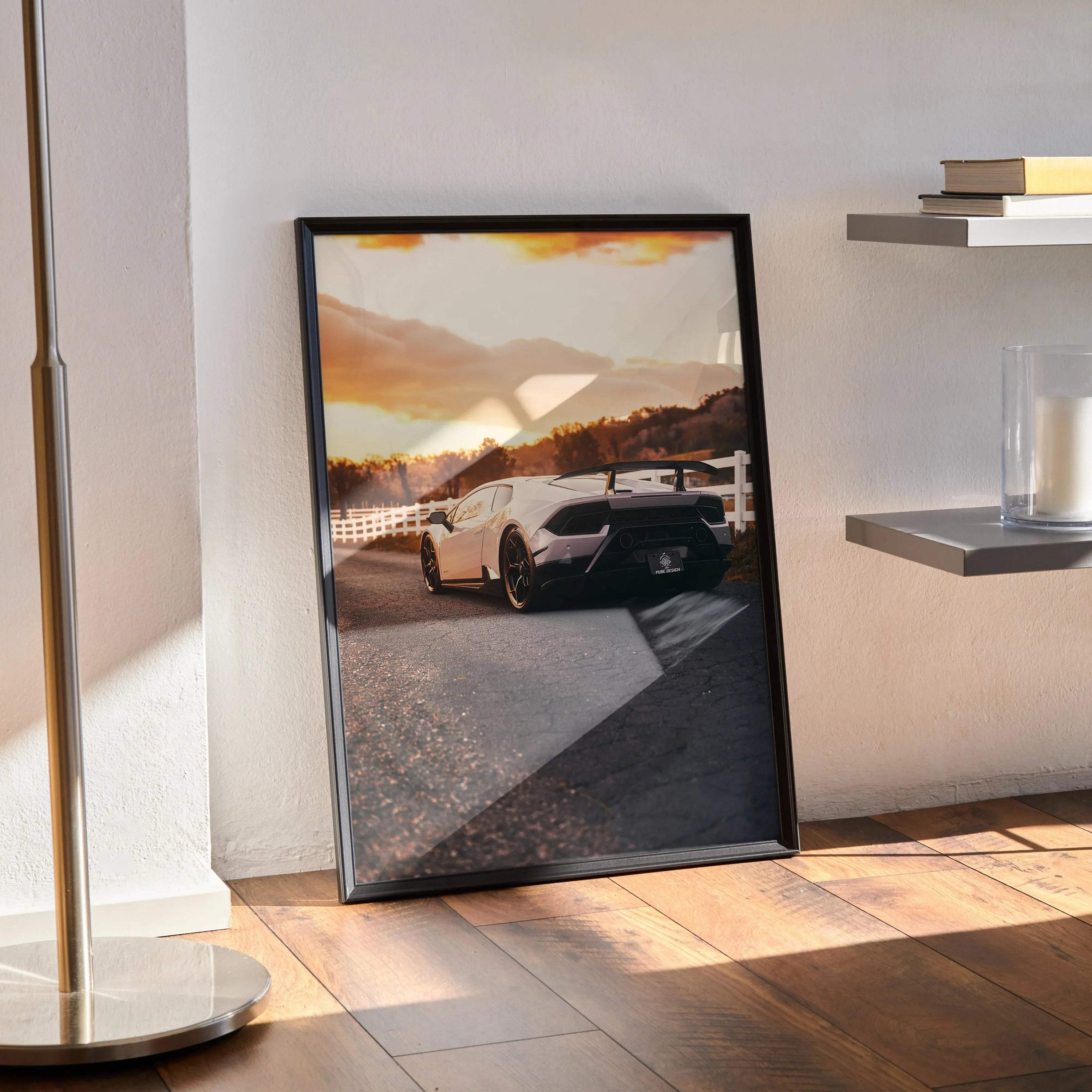 Lamborghini Huracan poster with sunset reflection, modern luxury automotive wall art in black frame.