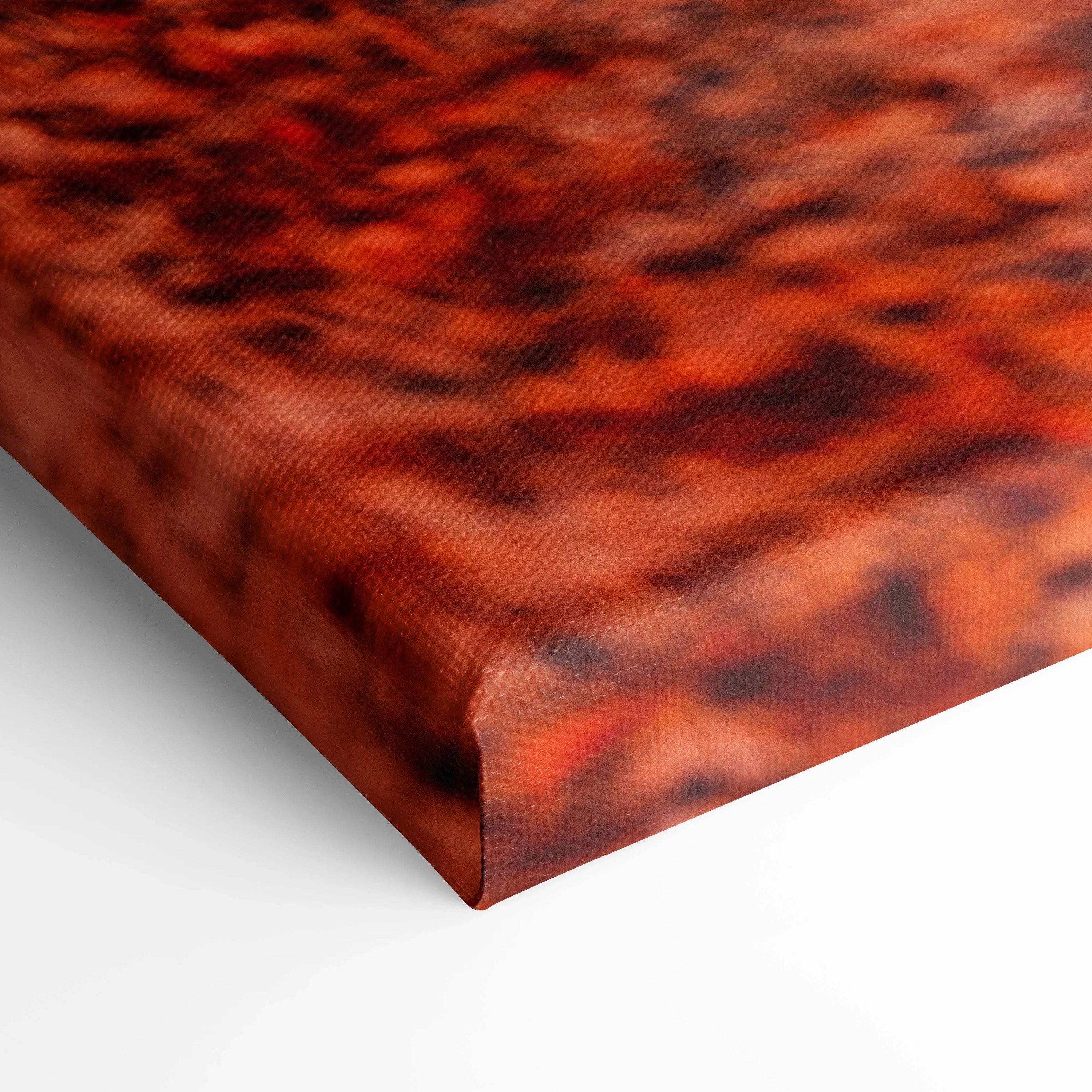 Close-up of vibrant red and black textured canvas art corner for wall art display.