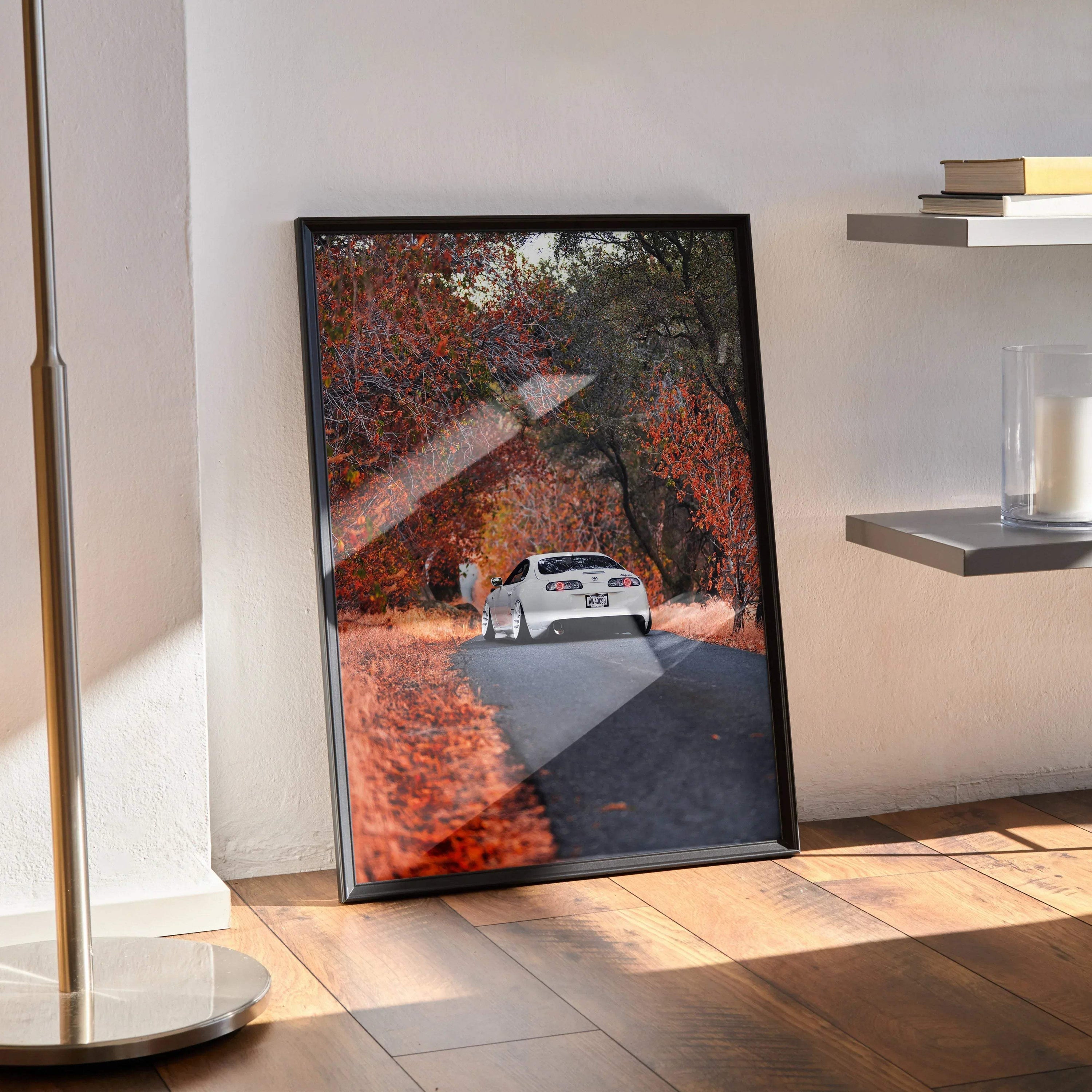 Toyota Supra MK4 poster wall art with autumn leaves and winding road in fall colors.