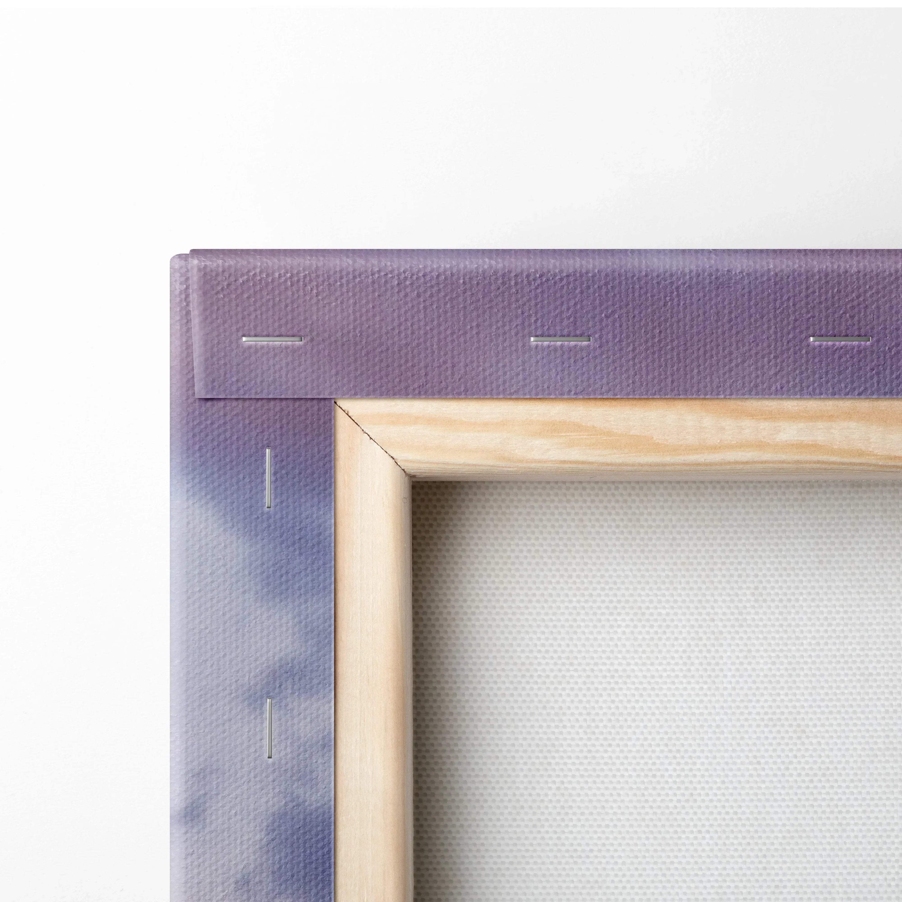 Close-up of wooden frame and canvas corner with visible staples, showcasing wall art construction.