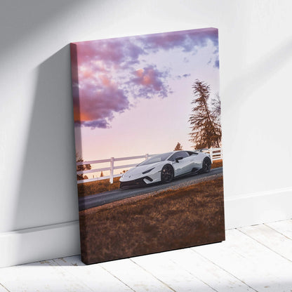 Lamborghini Huracan at sunset canvas wall art with vibrant sky and detailed car.