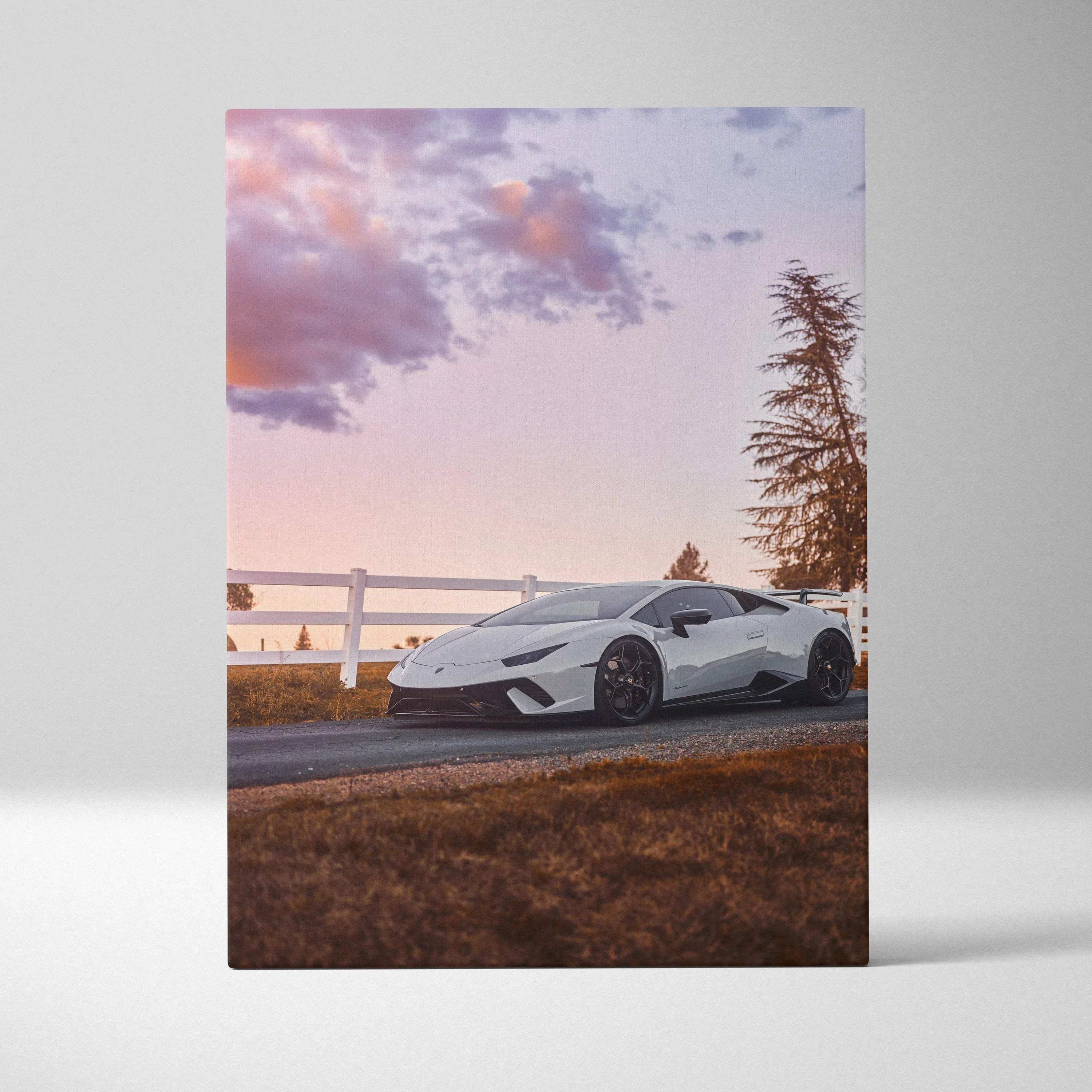 White Lamborghini Huracan parked on road at sunset with purple sky on vertical canvas wall art.