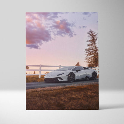 White Lamborghini Huracan parked on road at sunset with purple sky on vertical canvas wall art.