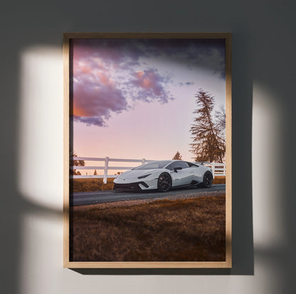 Lamborghini Huracan poster with white sports car at sunset and scenic rural background wall art.