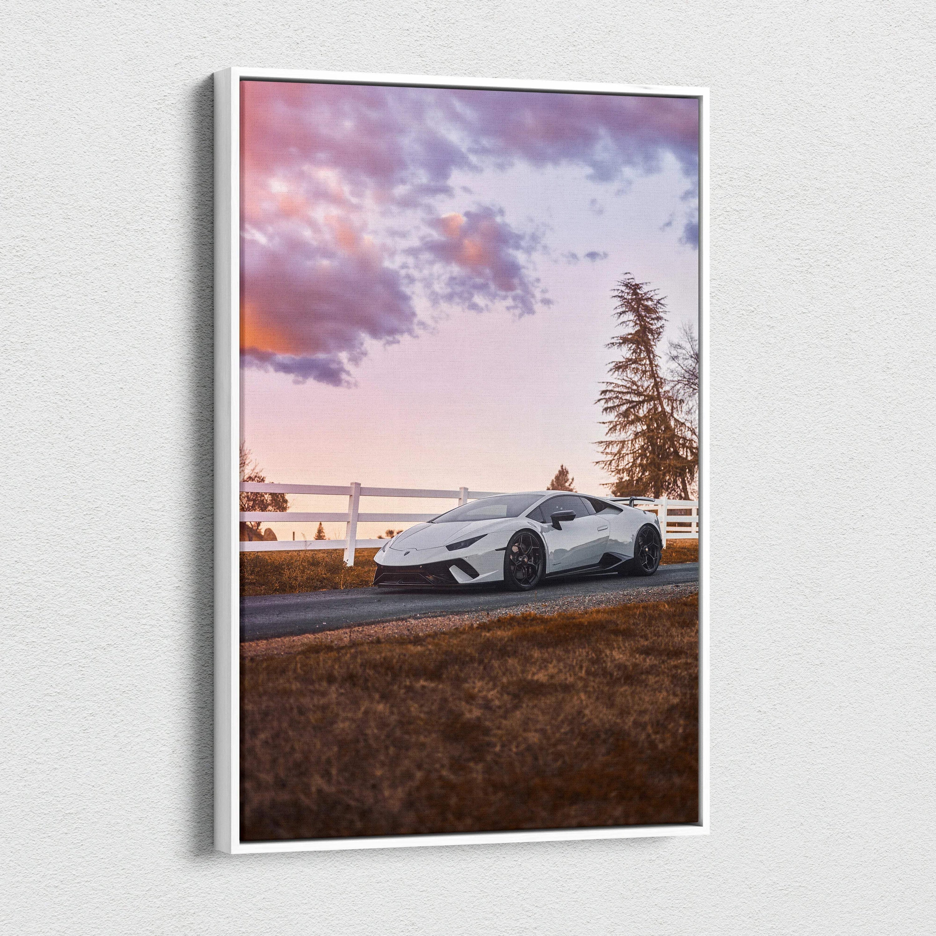 Lamborghini Huracan canvas wall art with sunset sky and rural fence background.