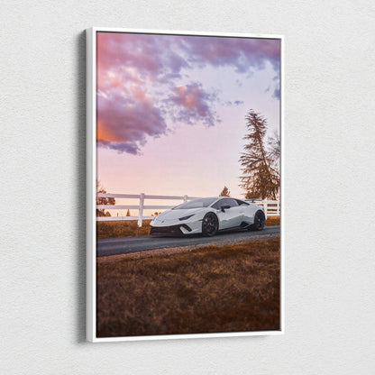 Lamborghini Huracan canvas wall art with sunset sky and rural fence background.