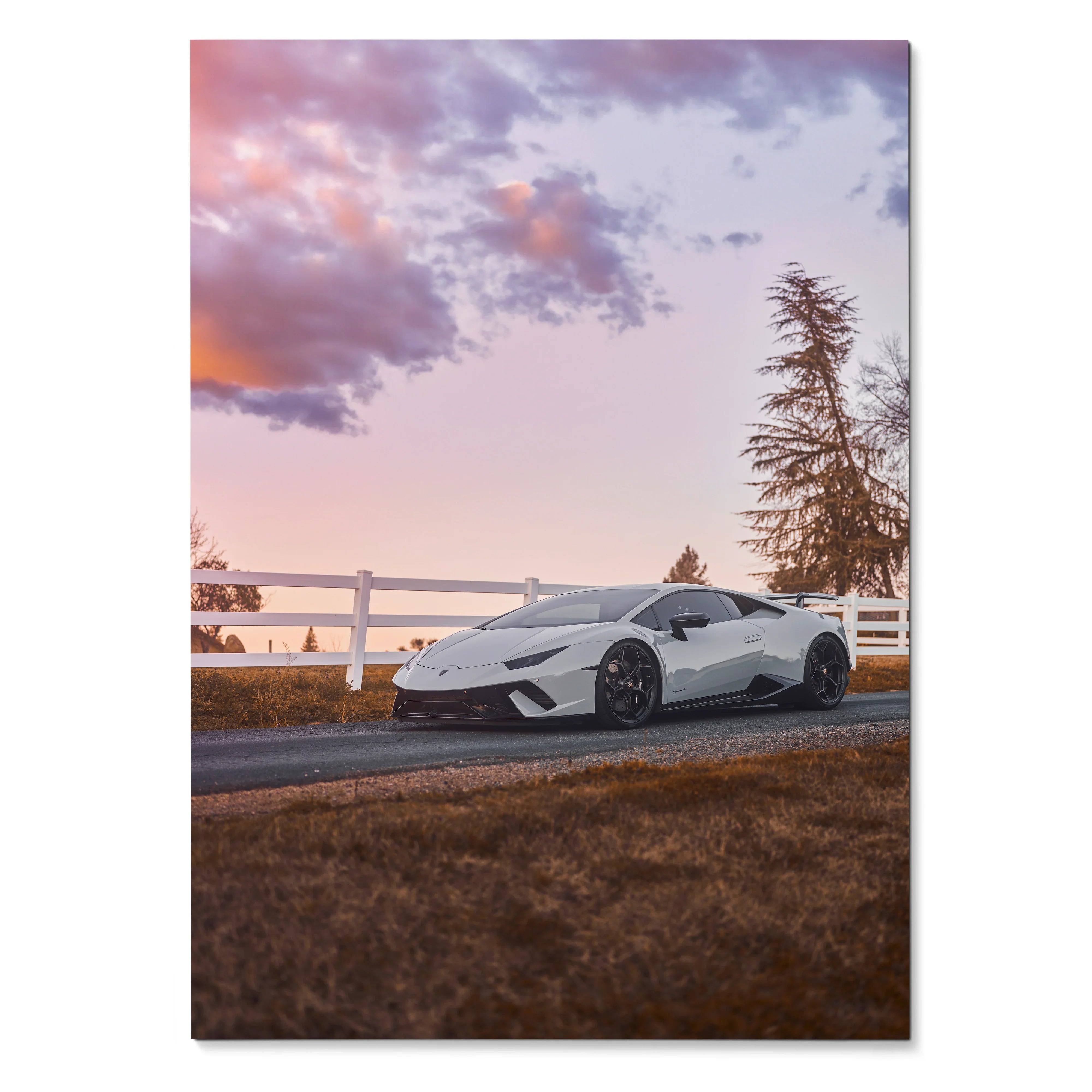 White Lamborghini Huracan parked on rural road at sunset poster wall art.