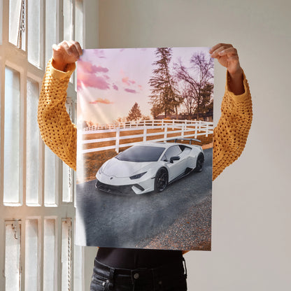Lamborghini Huracan poster wall art with white sports car on road at sunset.