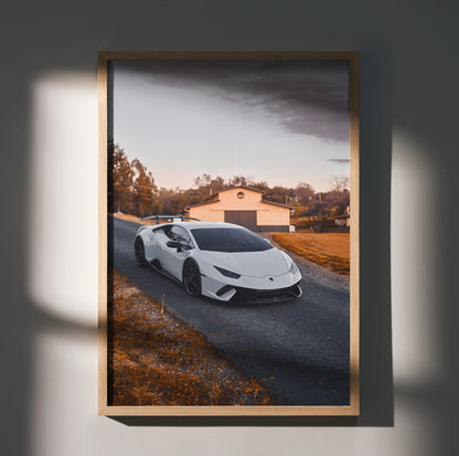 Lamborghini Huracan poster with white sports car on country road, premium automotive wall art.