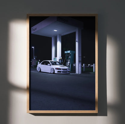 Mitsubishi Evo 8 white car parked at night under gas station canopy poster wall art.