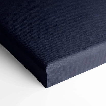 Close-up of black textured canvas wall art with wrapped edge for vertical canvas art print.
