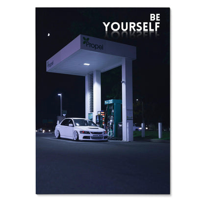 Motivational poster wall art featuring white Mitsubishi Evo 8 at night with "Be Yourself" text in bold white letters.