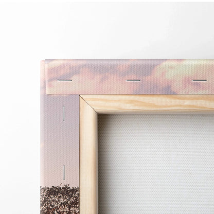 Close-up of wooden frame and stretched canvas showing Porsche GT4 wall art corner with sunset tones.