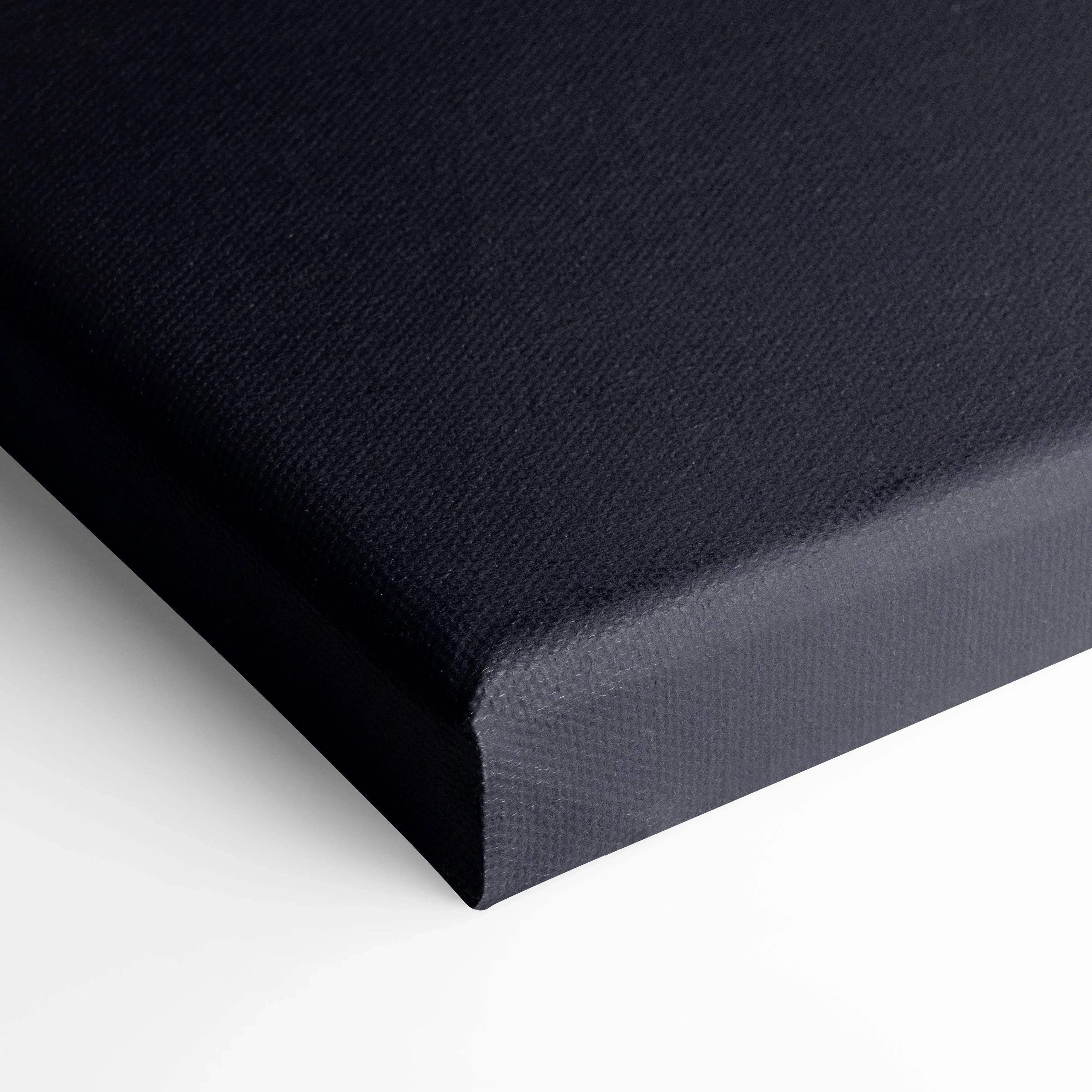 Black canvas corner detail showing texture and thickness, ideal for high-quality wall art.
