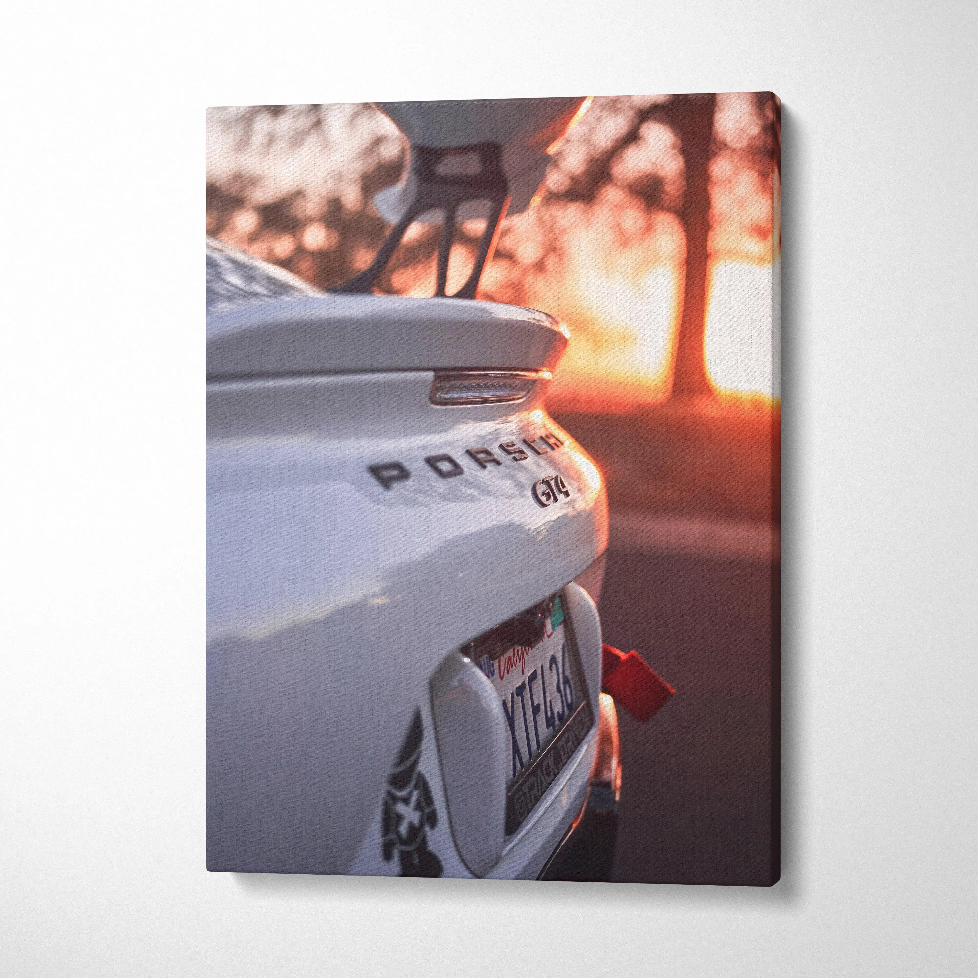 White Porsche GT4 rear detail at sunset on vertical canvas wall art.