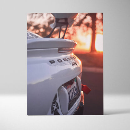 Porsche GT4 rear detail with sunset glow on vertical canvas wall art.
