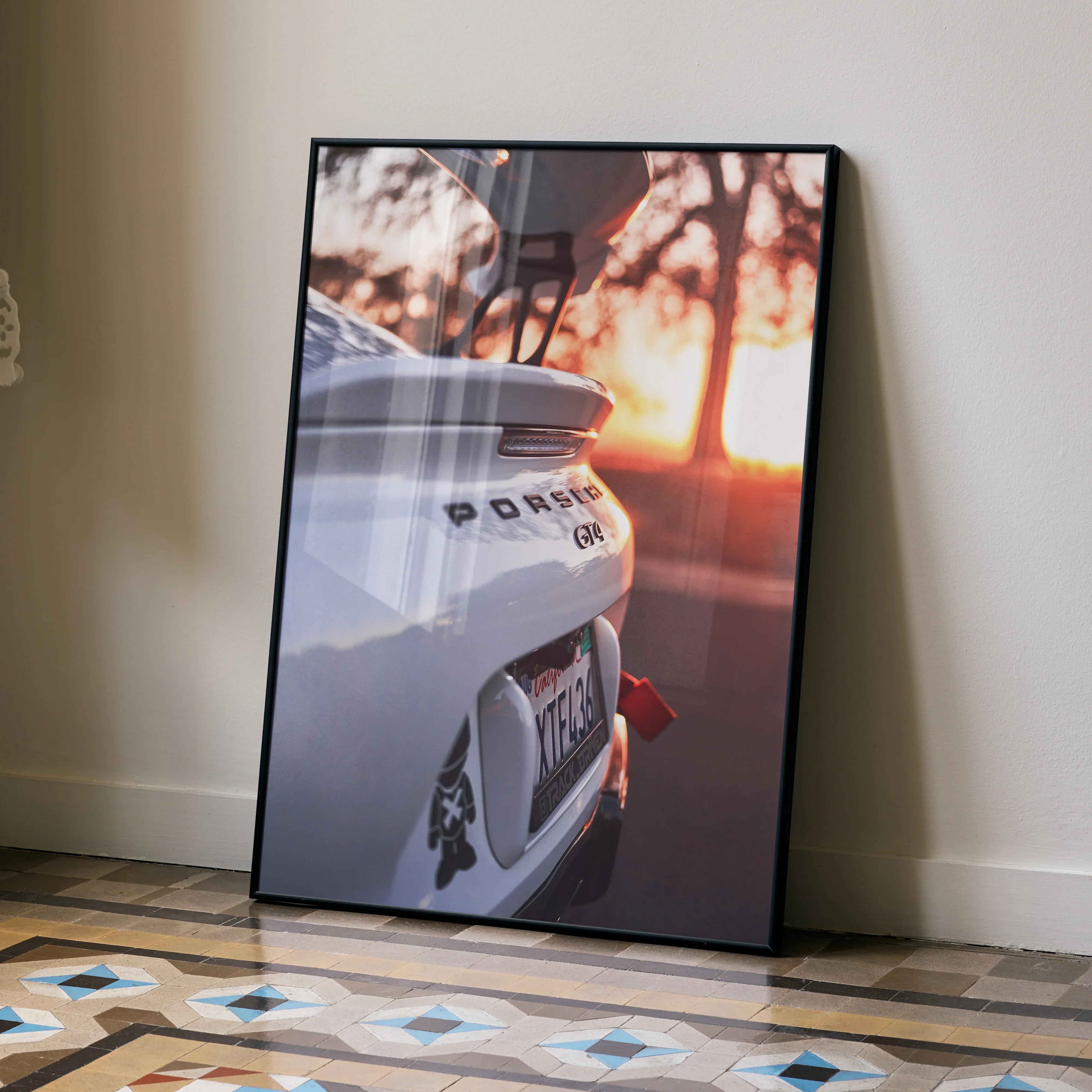 Porsche GT4 Clubman Edition rear view wall art poster in black frame with sunset reflection.