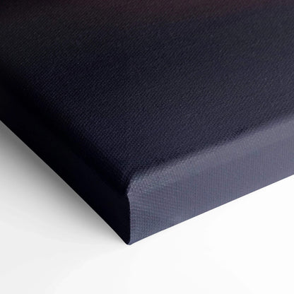 Black stretched canvas corner showing textured wall art material and wrapped edges of canvas art.