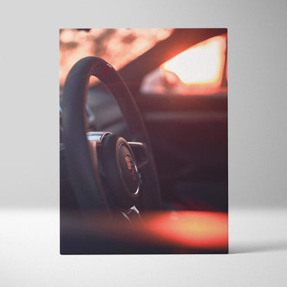 Porsche GT4 steering wheel close-up vertical canvas wall art with warm sunset lighting.