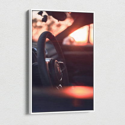 Vertical canvas art of Porsche GT4 steering wheel with warm sunset glow, museum-quality wall art canvas.