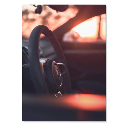 Porsche GT4 steering wheel close-up poster with warm sunset glow wall art.