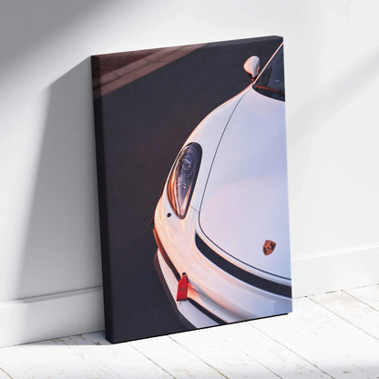 Porsche GT4 close-up vertical canvas wall art featuring sleek white car front and detail.