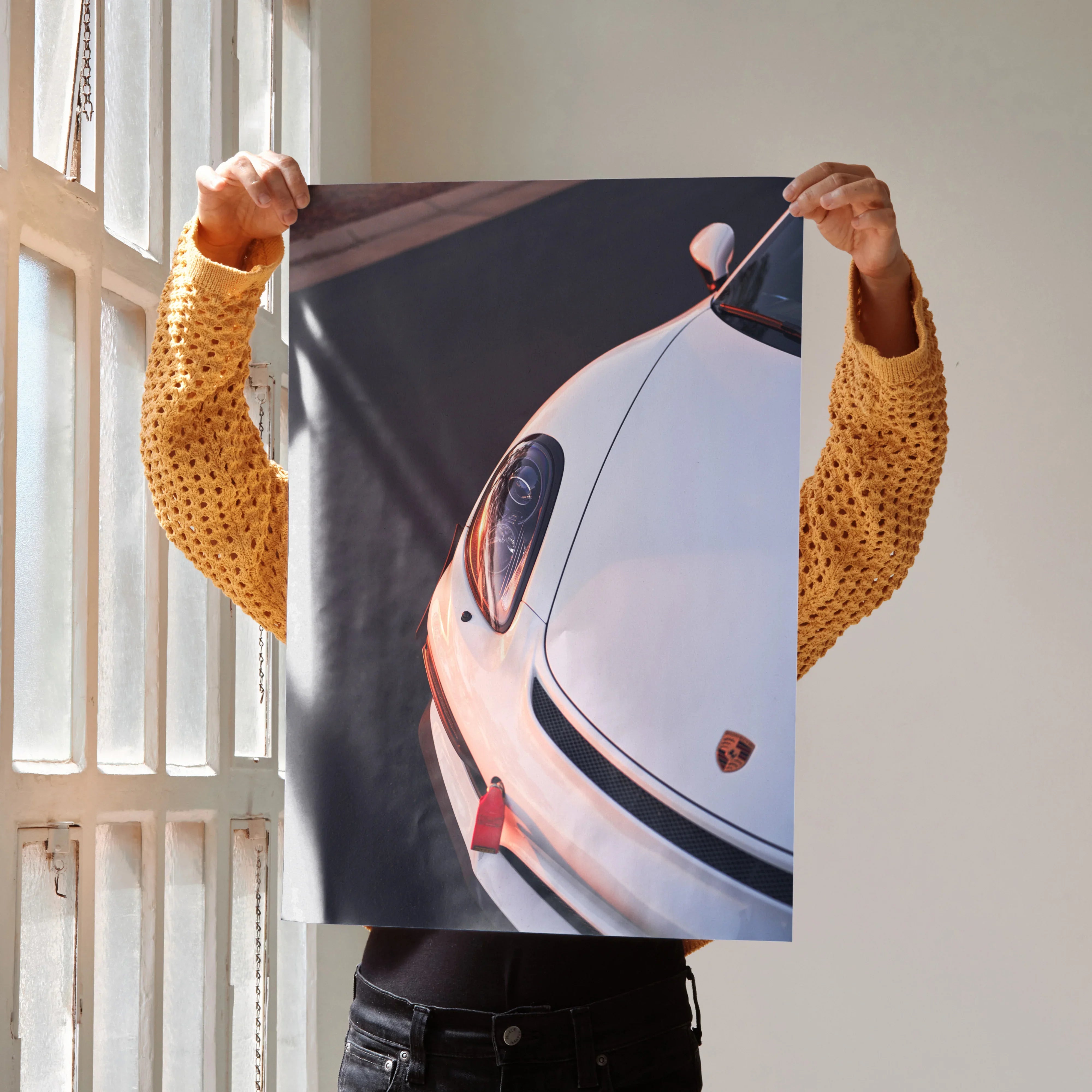 Porsche Cayman GT4 close-up poster with sleek white car front and emblem, wall art detail.