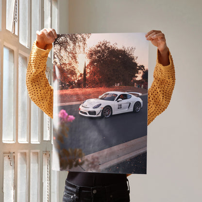 Porsche Cayman GT4 racing car at sunset on high-resolution poster wall art.