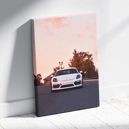 White Porsche GT4 on road at sunset canvas wall art with soft pink sky, vertical canvas art.