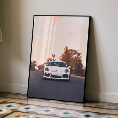 Porsche Cayman GT4 poster with white sports car on sunset road, automotive wall art.