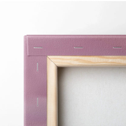 Close-up of stretched canvas corner with tight staples on wooden frame for wall art canvas print.