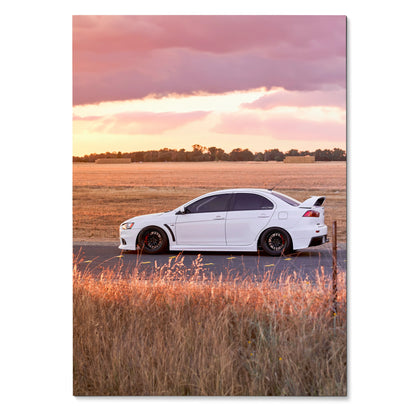 Mitsubishi Evo 10 parked on road at sunset in high-resolution poster wall art.