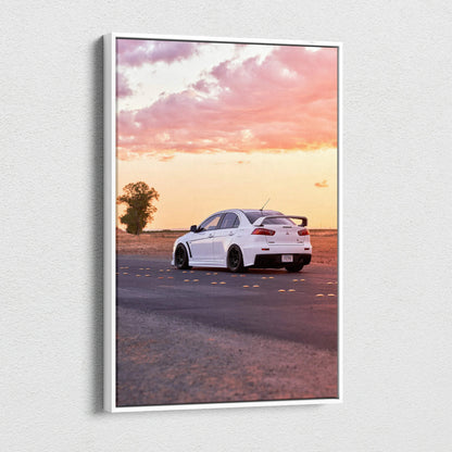 Vertical canvas wall art featuring a white Mitsubishi Evo 10 on a sunset road scene.