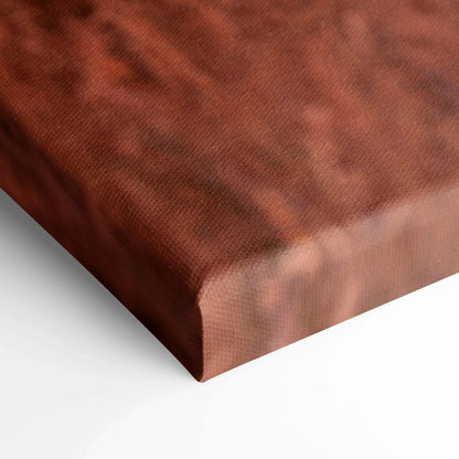 Close-up of textured vertical canvas wall art with warm brown and sunset tones.