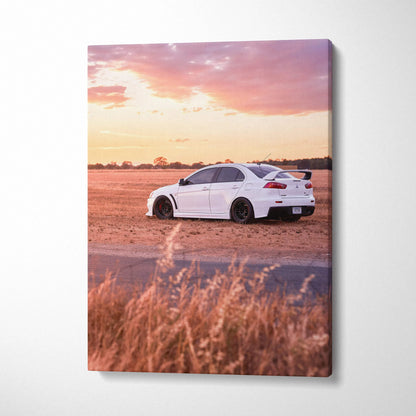 Mitsubishi Evo 10 parked on dirt road at sunset canvas wall art in vertical format.