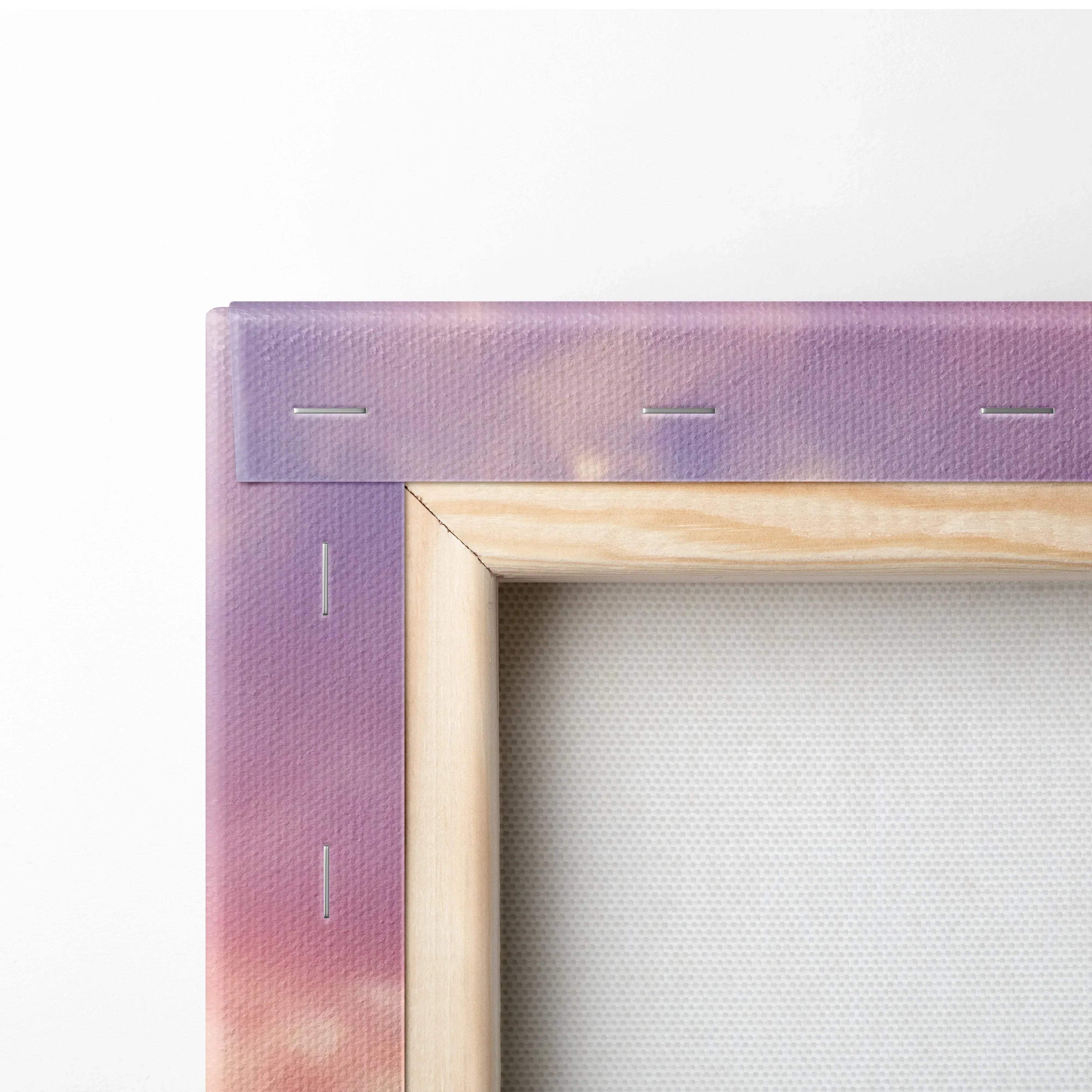 Close-up of a wood-framed vertical canvas print corner with purple and pink gradient canvas art.