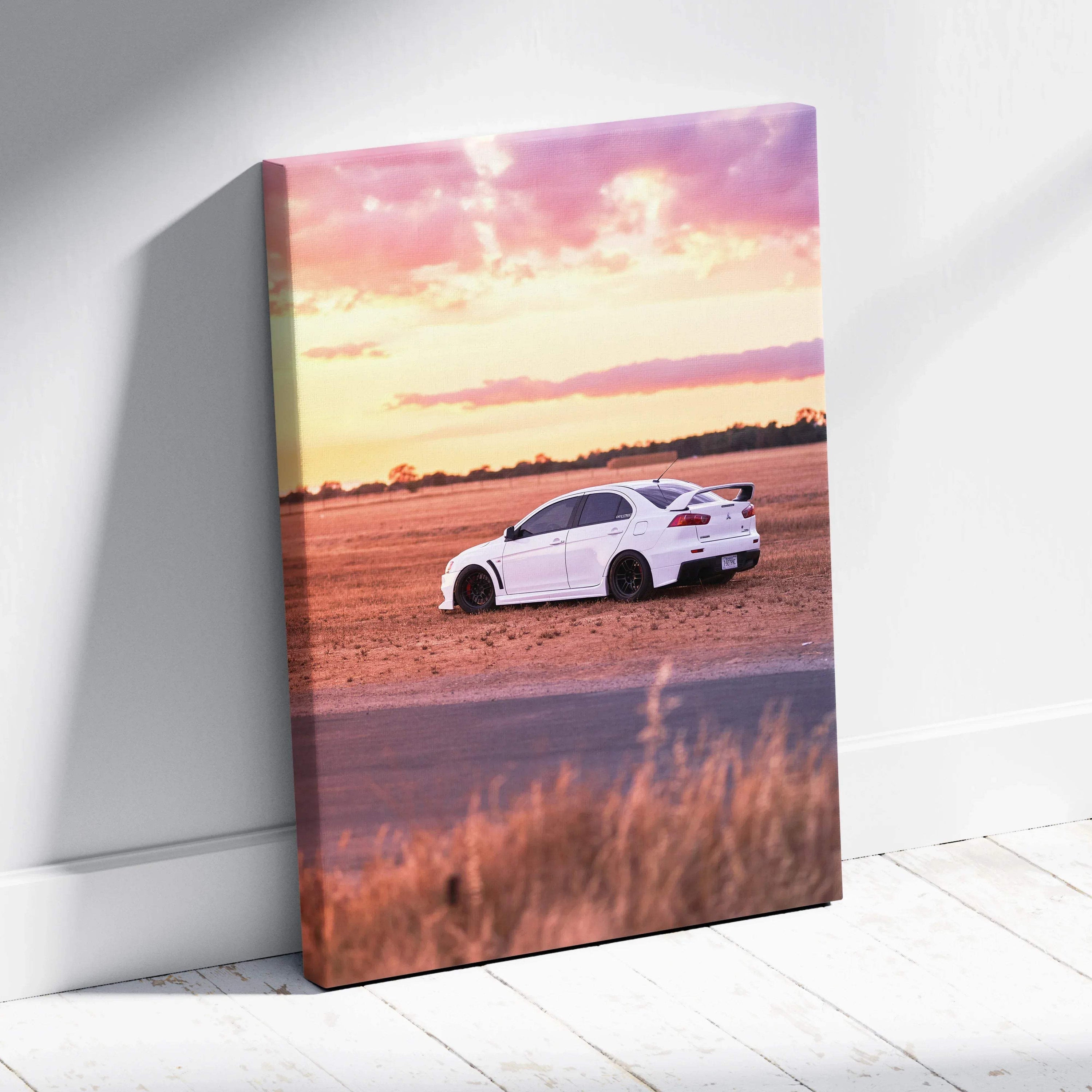 Mitsubishi Evo 10 driving on open road at sunset canvas wall art in vertical format.