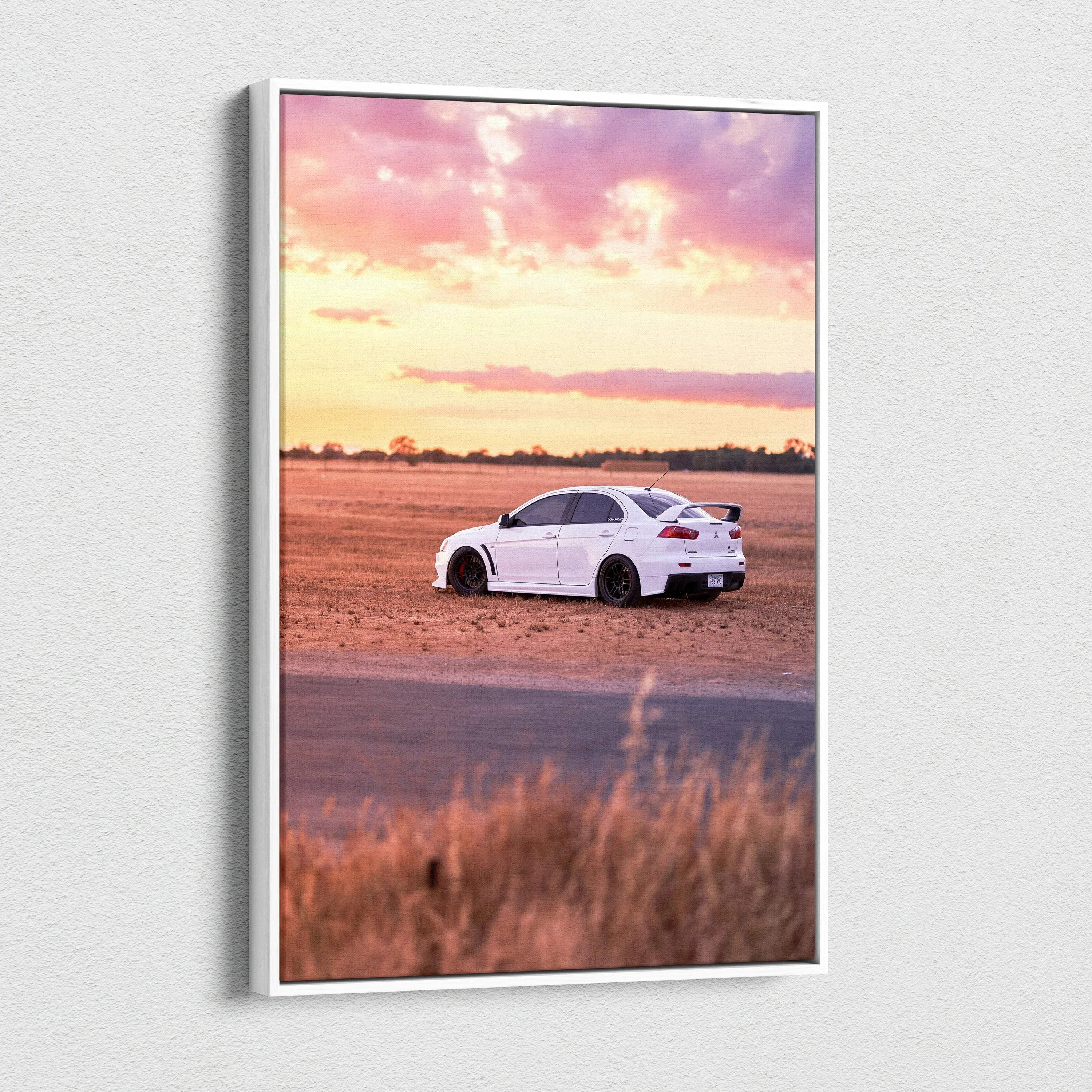 Mitsubishi Evo 10 white car on dirt road at sunset vertical canvas wall art.