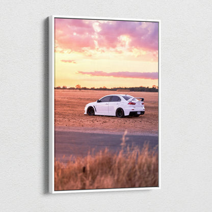 Mitsubishi Evo 10 white car on dirt road at sunset vertical canvas wall art.